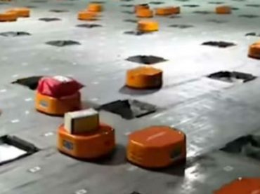 Китайская компания заменила складских рабочих армией роботов
