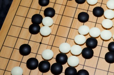 Искусственный интеллект AlphaGo покидает спорт после победы над лучшим игроком в го в мире